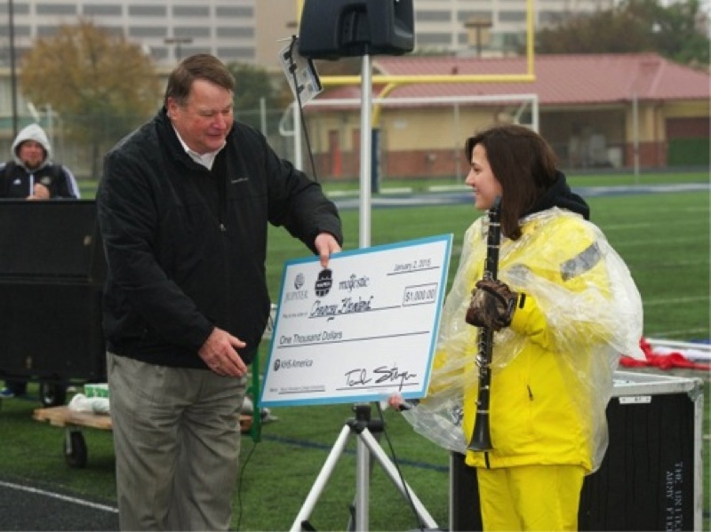 (Left to Right): Tabor Stamper, President of KHS America, awards Chauncey Kleveland $1,000 scholarship